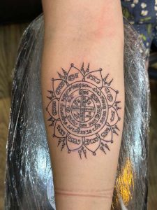 Sak Yant tattoo design of a lotus flower