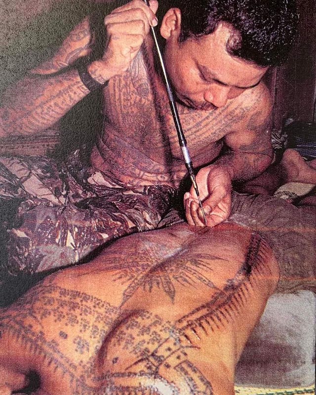 Vibrant Sak Yant tattoo for protection and strength during war